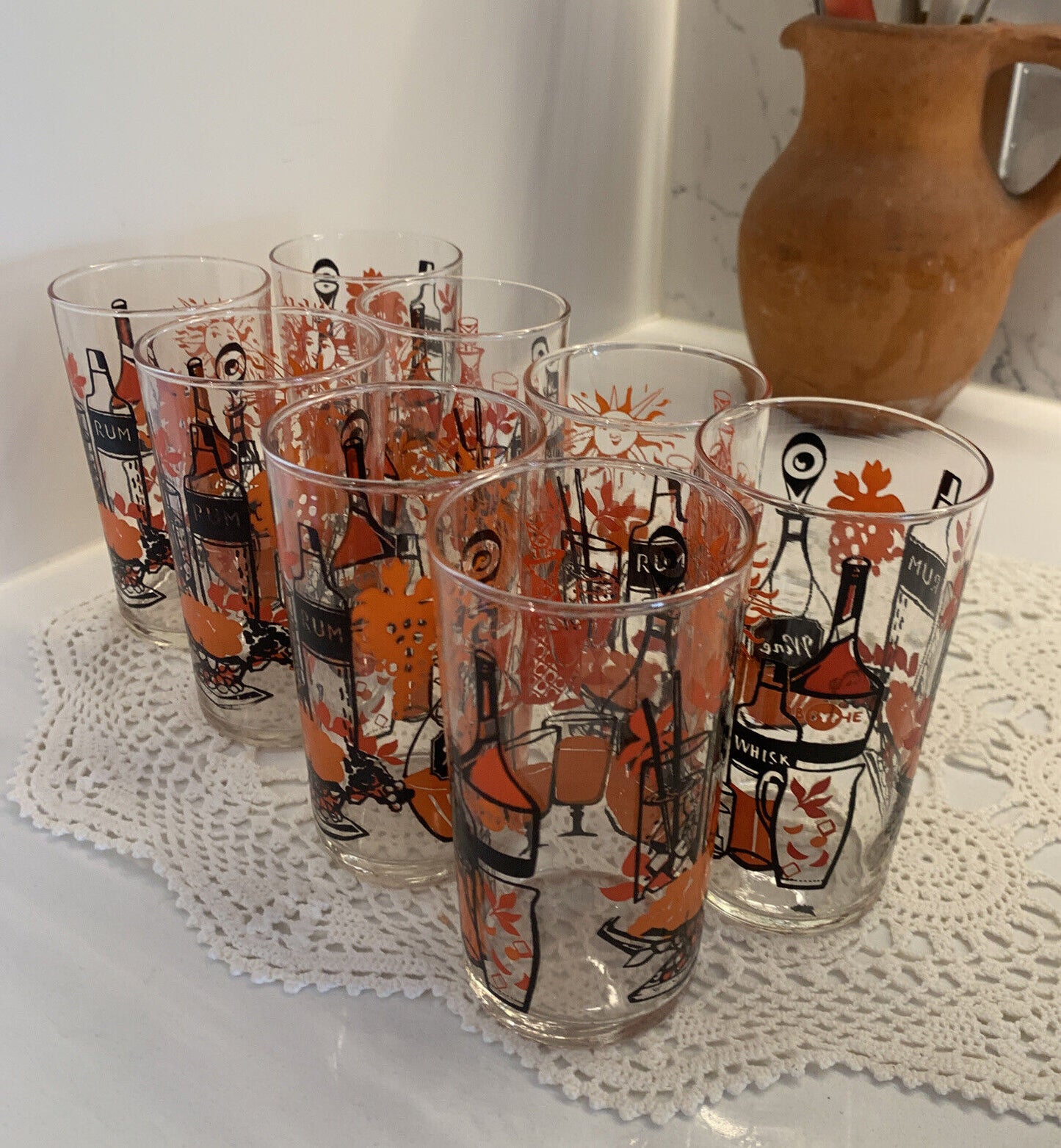 8 X Glasses MCM 12cm Tumblers Rum Whiskey Wine Clear Raised Orange Black Print