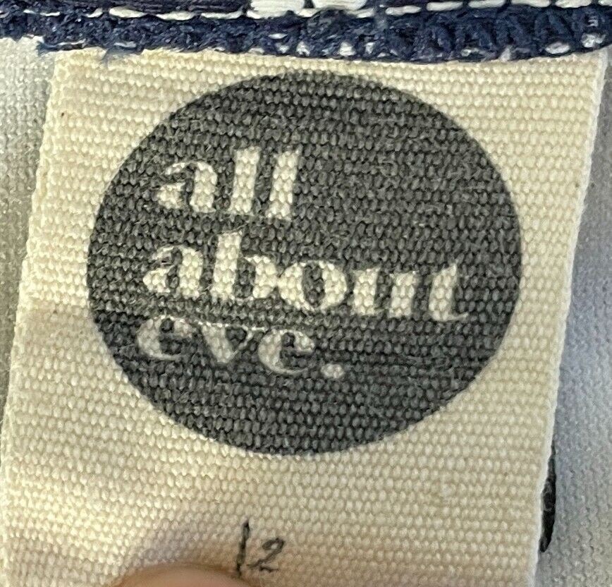 ALL ABOUT EVE Bikini Pants Navy White Polka Dot Side Tie Frill Bottoms Sz 12 NEW
