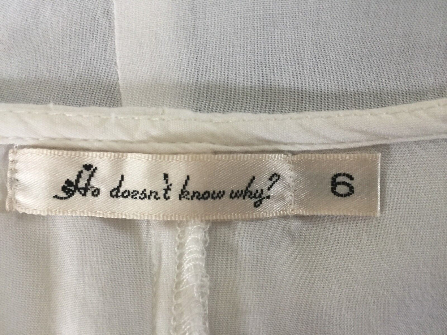 HE DOESN'T KNOW WHY Dip Hem Top White Black Trim Cut Out Sleeve Sz 6 AU 8 10 NEW