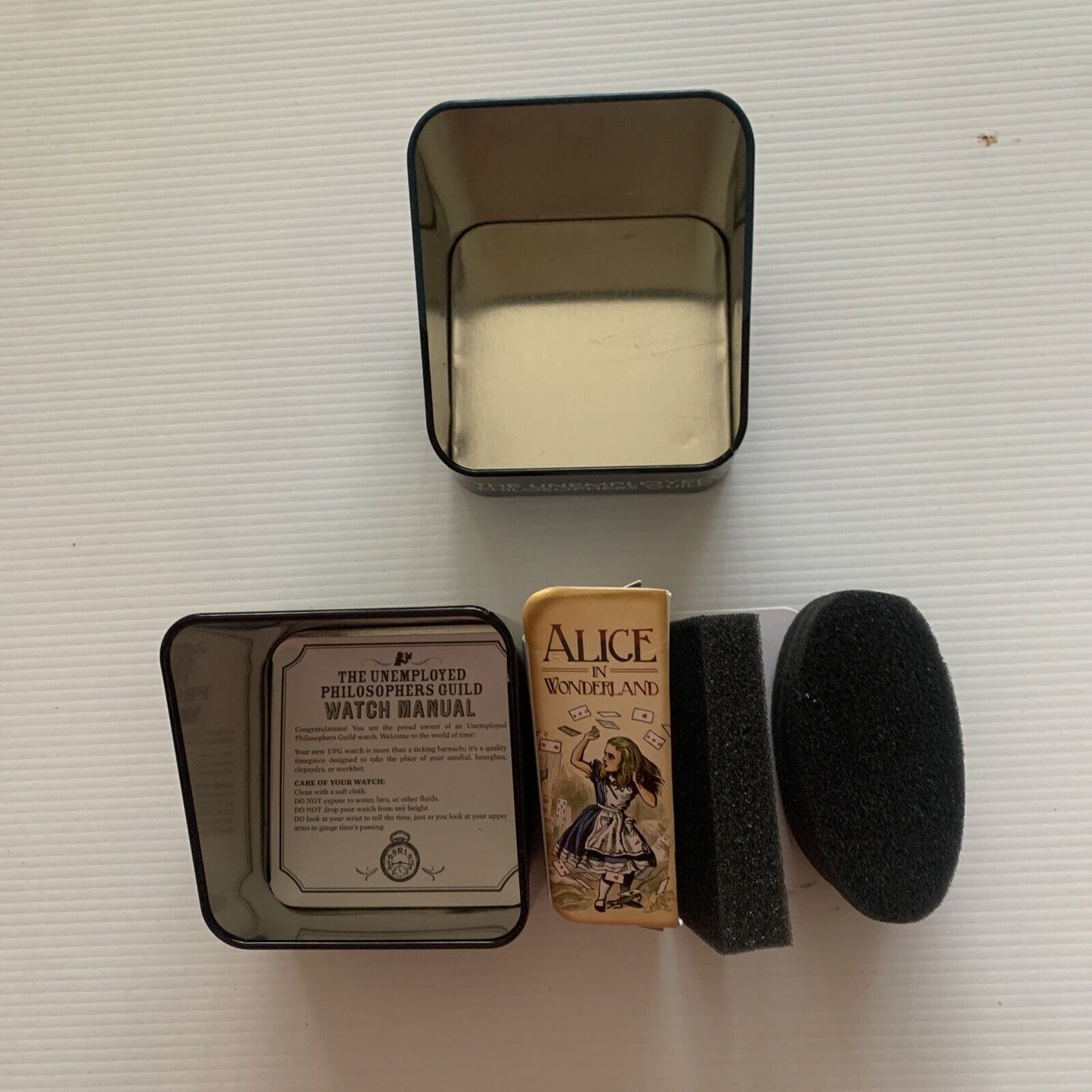 EMPTY BOX WATCH Unemployed Philosophers Guild Alice In Wonderland Tempus Fugit