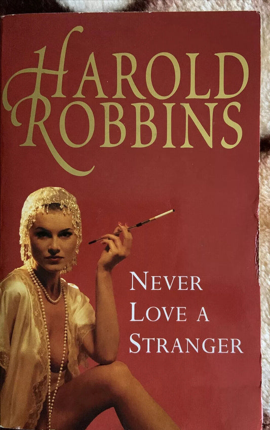 Fiction PB NEVER LOVE A STRANGER by Harold Robbins Foxing 1997 Novel Rare