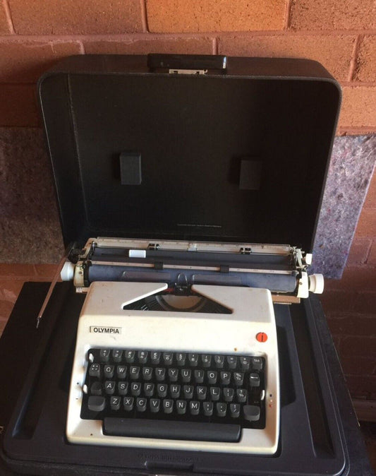 OLYMPIA Typewriter In Working  Condition W Hard case Portable