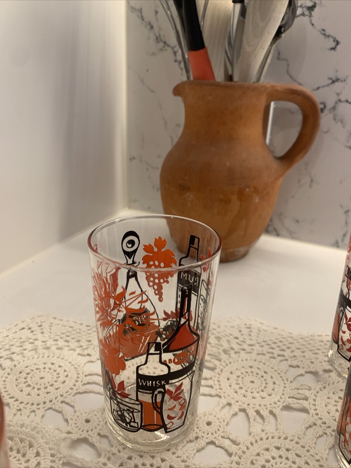 8 X Glasses MCM 12cm Tumblers Rum Whiskey Wine Clear Raised Orange Black Print