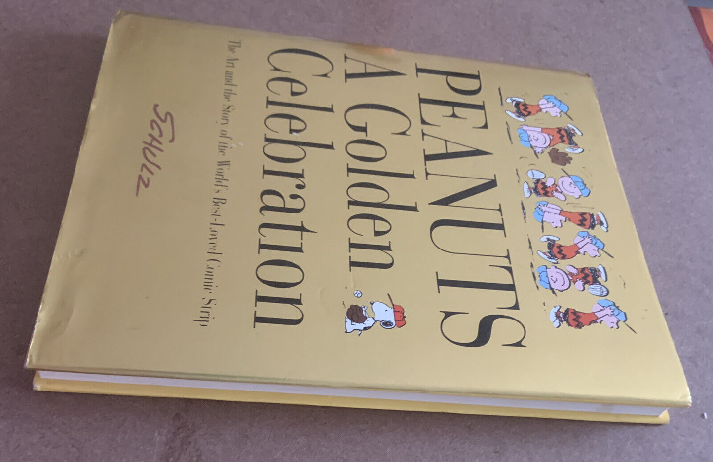 PEANUTS a Golden Celebration Charles M Schulz Table Gold DJ HC 1999 Comic Strip