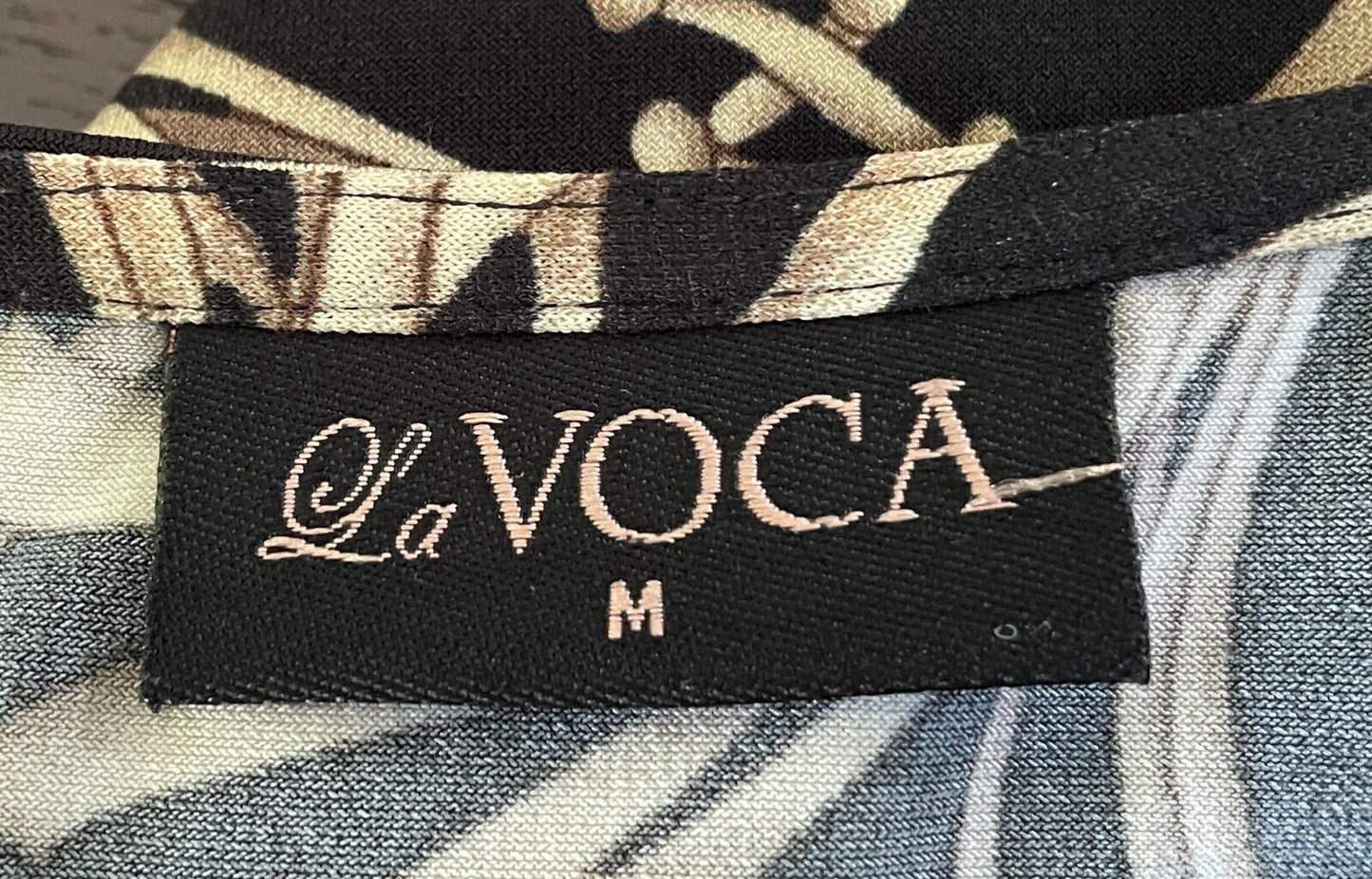 LA VOCA Wrap Top Black Beige Gold Print Blouse 3/4 Sleeve Stretch Size M 12 NEW