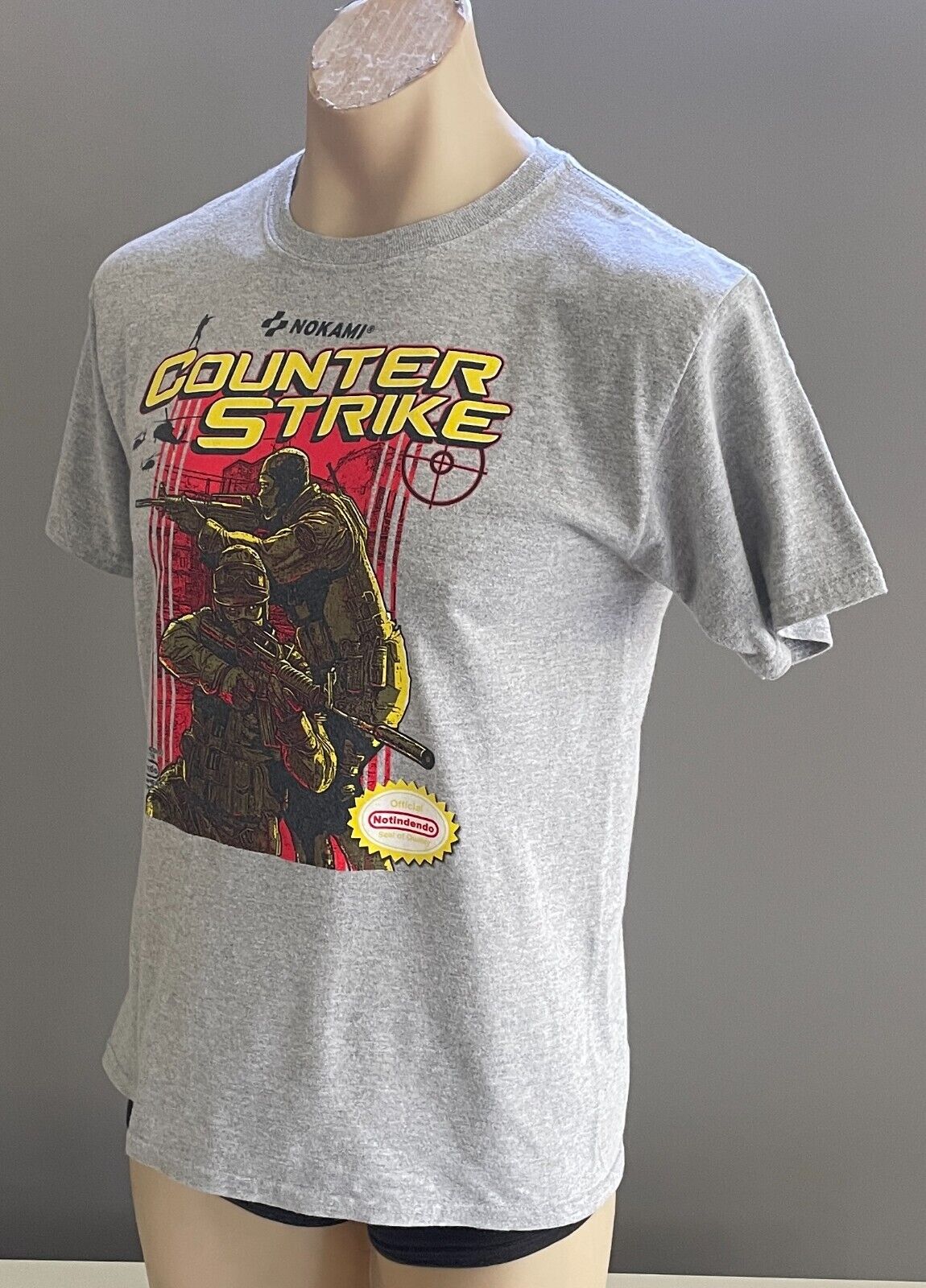 Vintage NINTENDO Game Nokami Counter Strike T-Shirt Size XL Grey With Print 2011