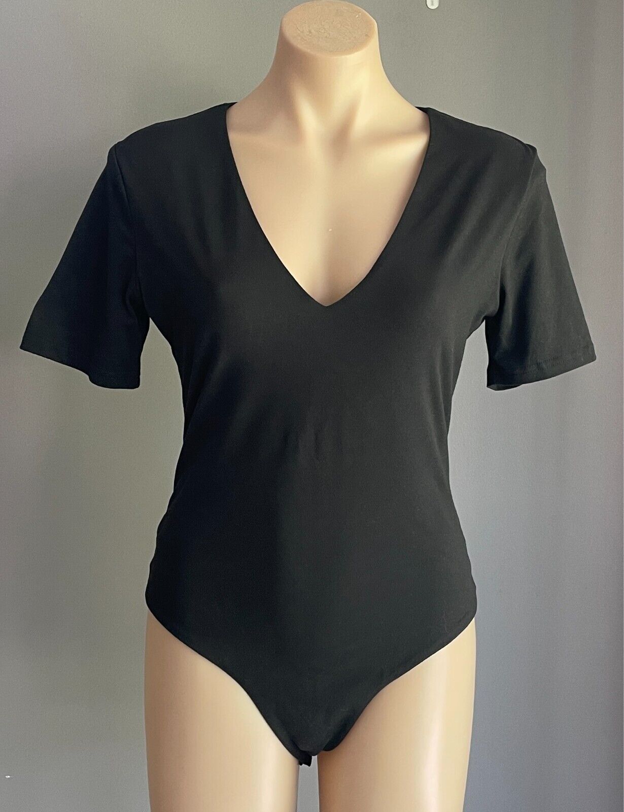 ATMOS & HERE Black Bodysuit Size 12 Short Sleeve V-Neck Stretch Fabric Thong Cut