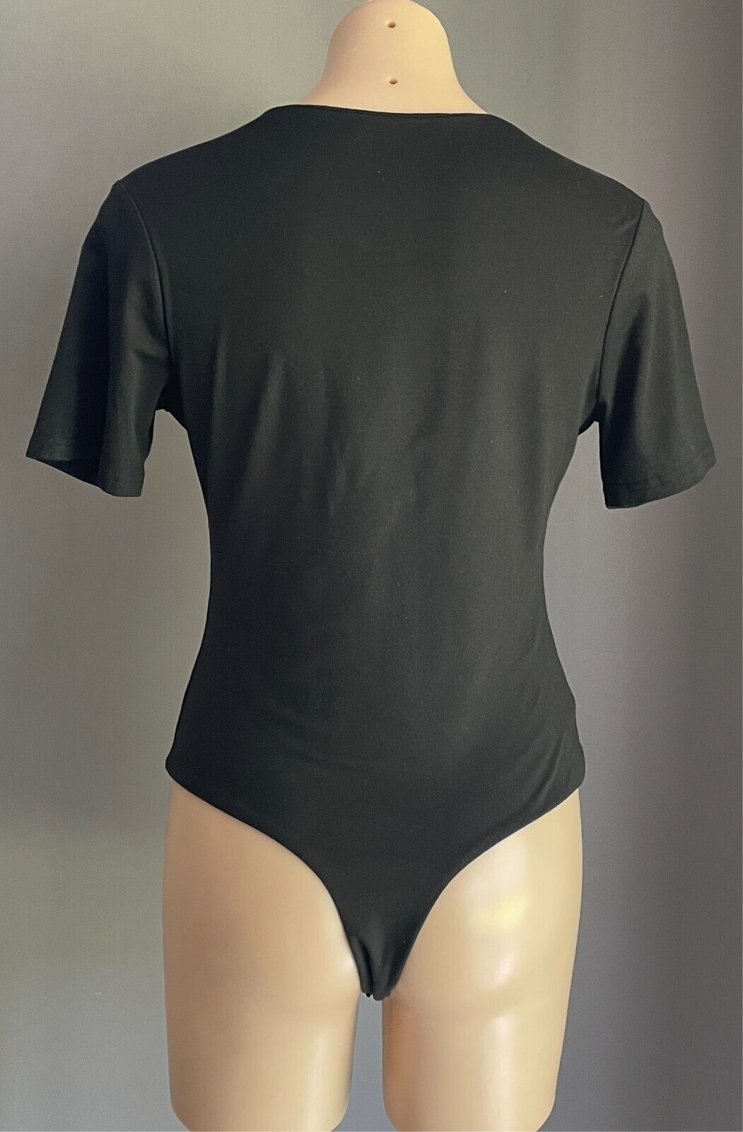 ATMOS & HERE Black Bodysuit Size 12 Short Sleeve V-Neck Stretch Fabric Thong Cut