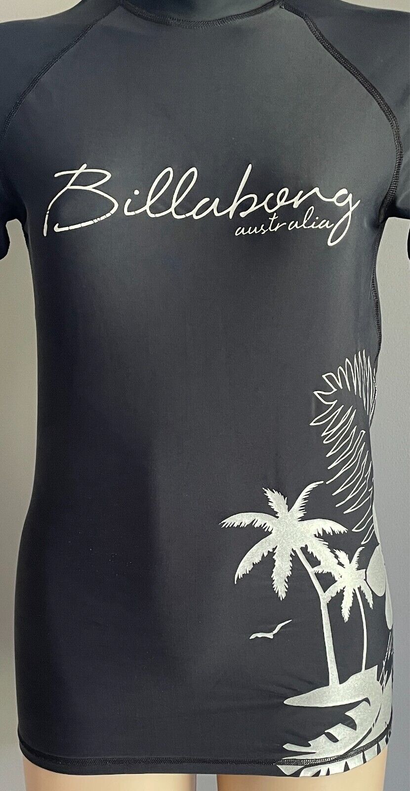 BILLABONG Rash Vest Size 10 Black With Silver Tropical Logo Print Short Sleeves