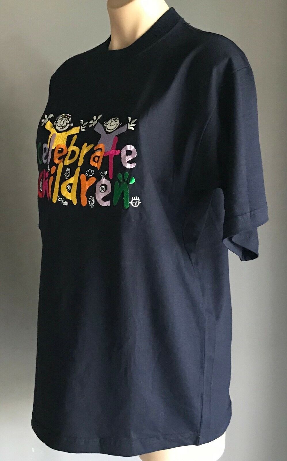 Unisex "Celebrate Children" T-Shirt Embroidered Logo Motif Size L Navy Blue NEW
