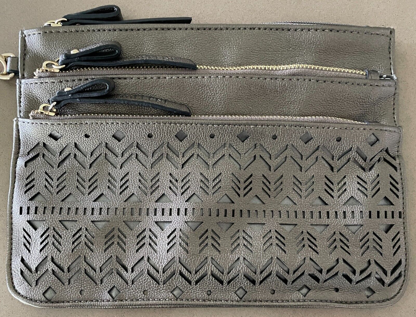 Laser Cut Bronze Pleather Cut Out Design Wrist Strap Clutch Bag Zip Pockets NEW