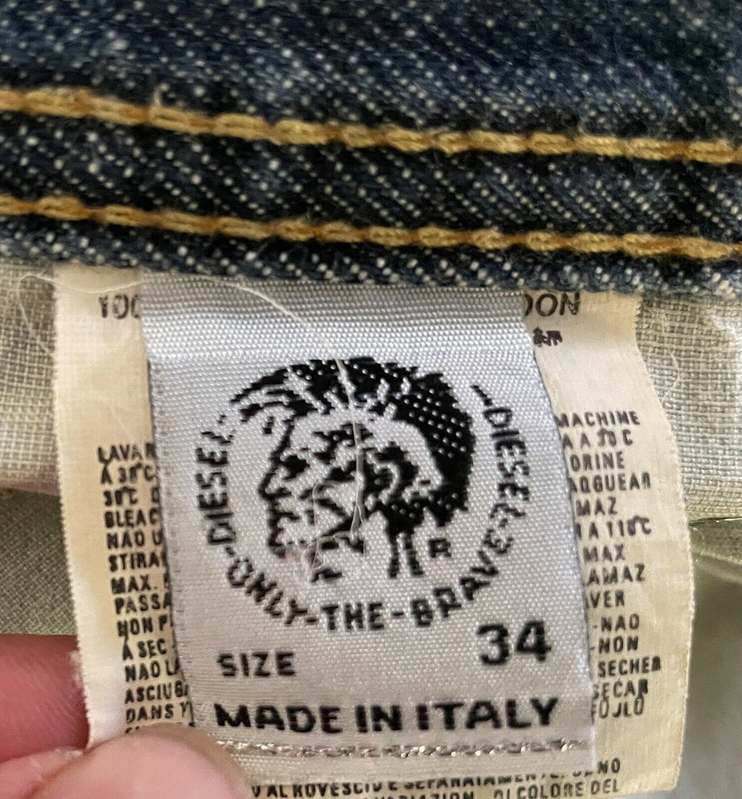 Mens DIESEL Jeans  Blue Denim Faded in Places & Distressed Hems Size 34 Vintage