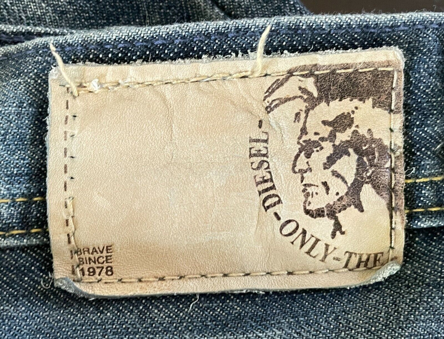 Mens DIESEL Jeans  Blue Denim Faded in Places & Distressed Hems Size 34 Vintage