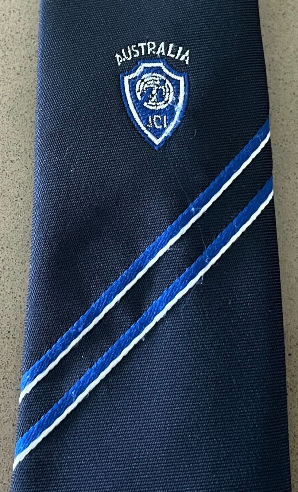 AUSTICO Australia Necktie Junior Chamber International Navy Blue Thin Logo Tie