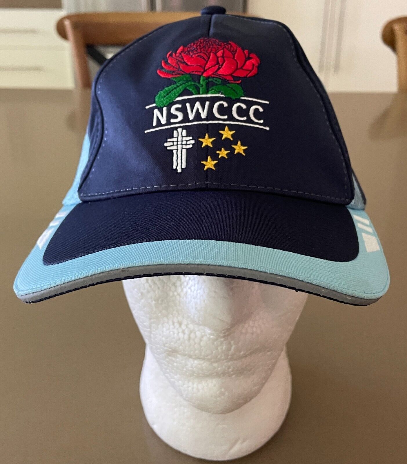 Cap NSW Combined Catholic Colleges Blue & Multicolour Logo Print Hat Curved Bill