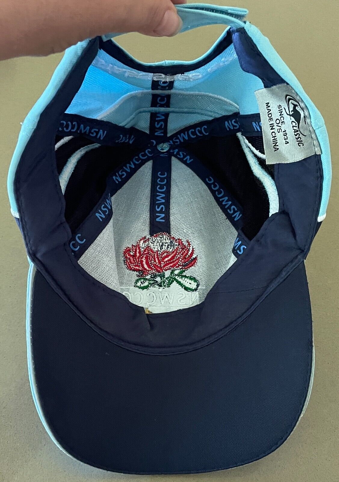 Cap NSW Combined Catholic Colleges Blue & Multicolour Logo Print Hat Curved Bill