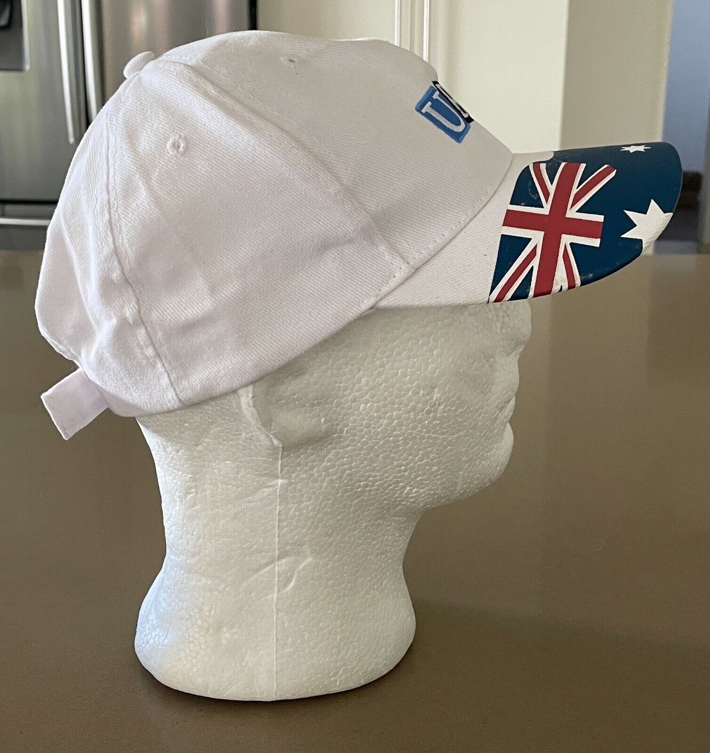URM Baseball Cap White Adjustable Curved Brim Australian Flag on Visor One Size