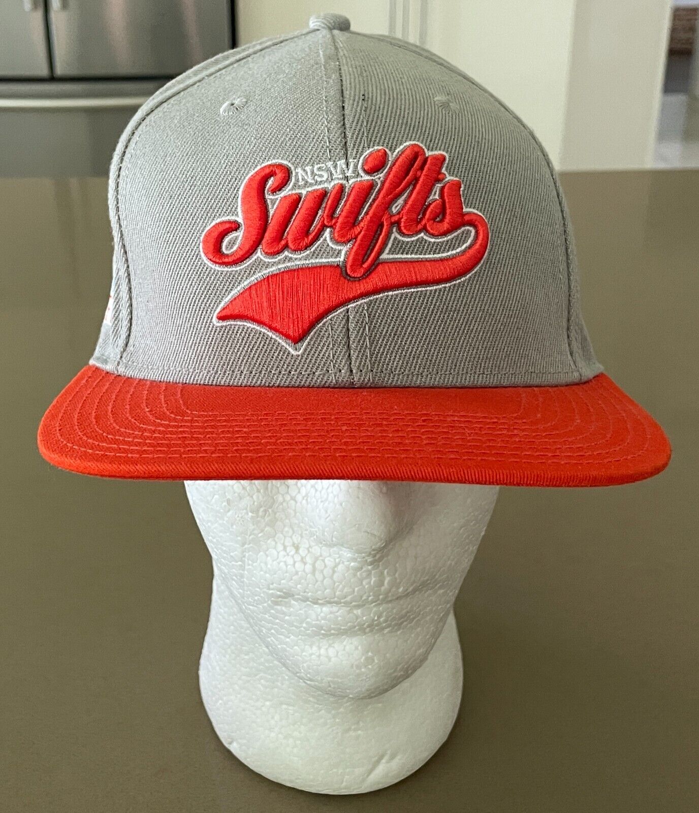 Fan Cap NSW SWIFTS Netball Taupe and Orange Fan Adjustable Flat Bill Hat OSFM