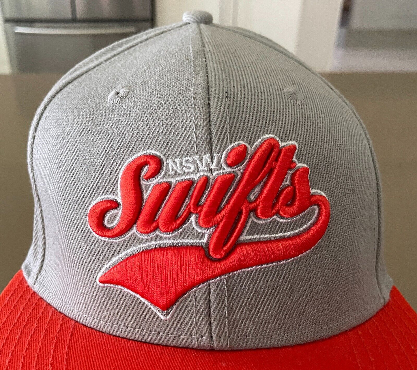 Fan Cap NSW SWIFTS Netball Taupe and Orange Fan Adjustable Flat Bill Hat OSFM