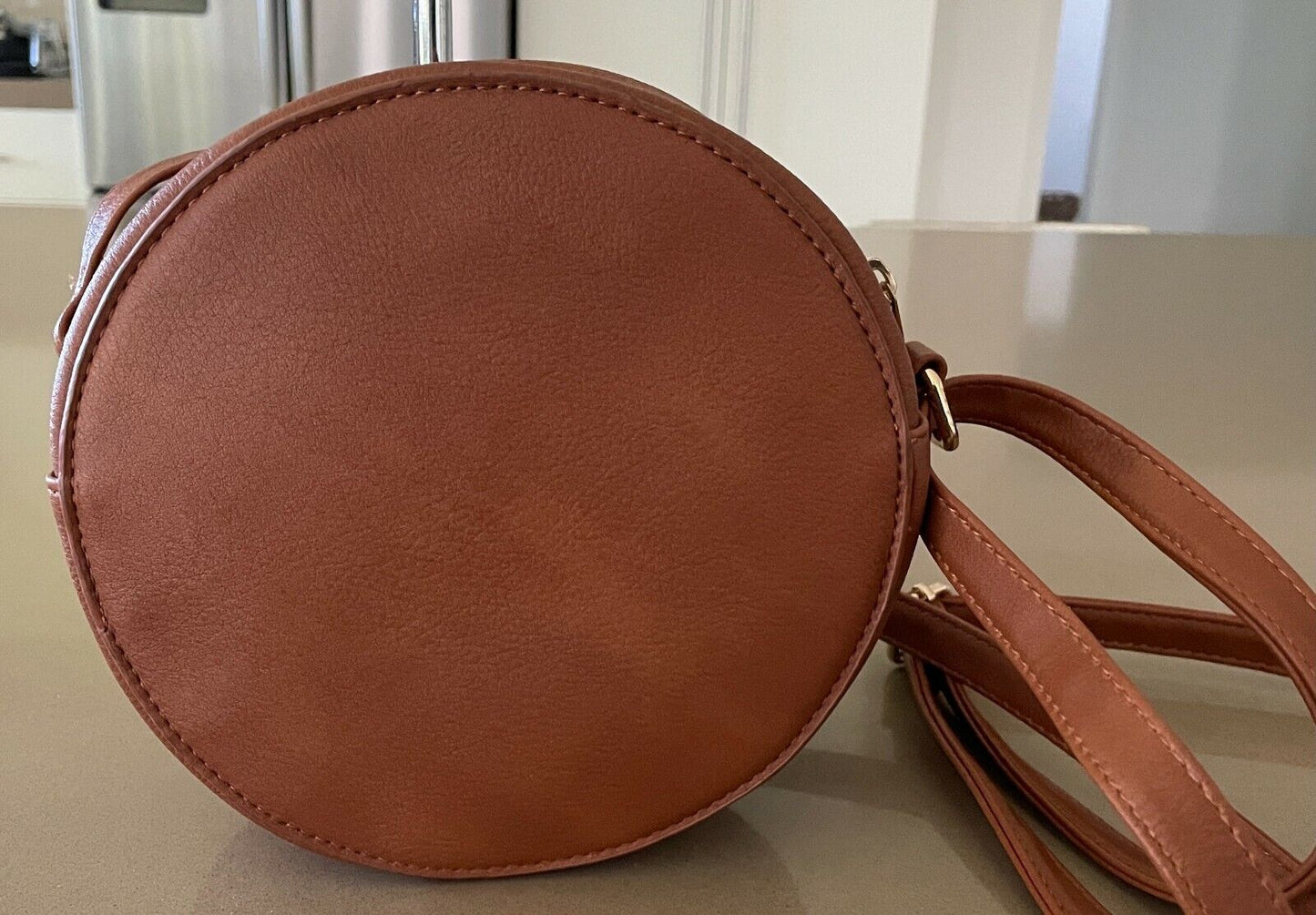 B COLLECTION Tan PVC Round Shoulder Bag Laser Cut Adjust Strap Crossbody NEW